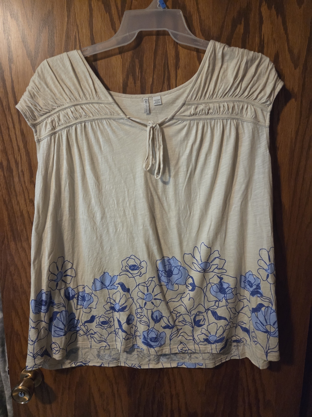 Cato Cream Tunic with Blue Floral Hem and Tie Neck